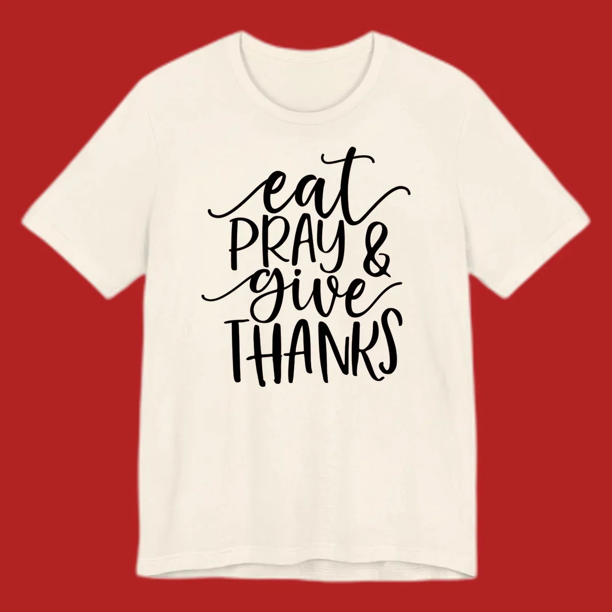 Eat Pray Give Thanks hand-lettered design with white text on a dark background.