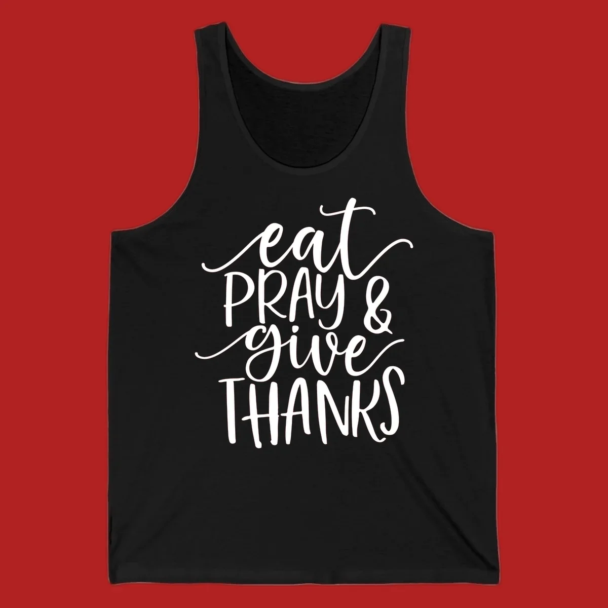Eat Pray Give Thanks hand-lettered design with white text on a dark background.