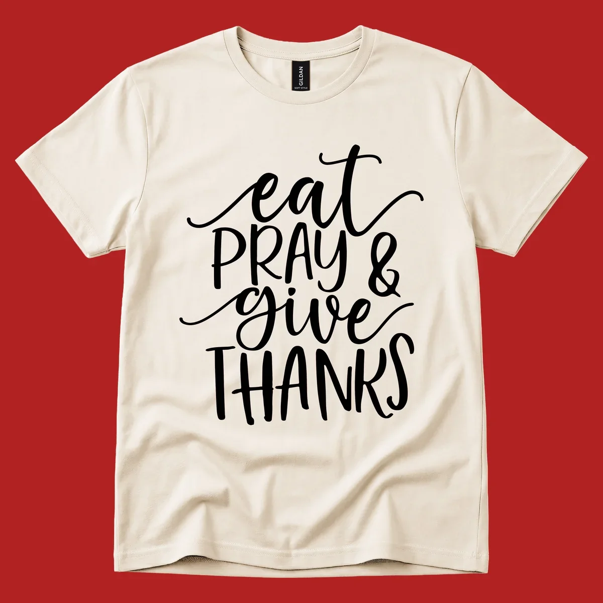 Eat Pray Give Thanks hand-lettered design with white text on a dark background.