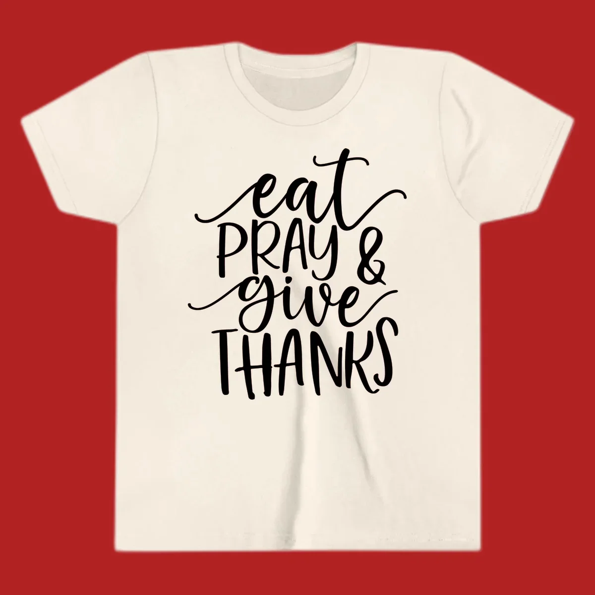 Eat Pray Give Thanks hand-lettered design with white text on a dark background.