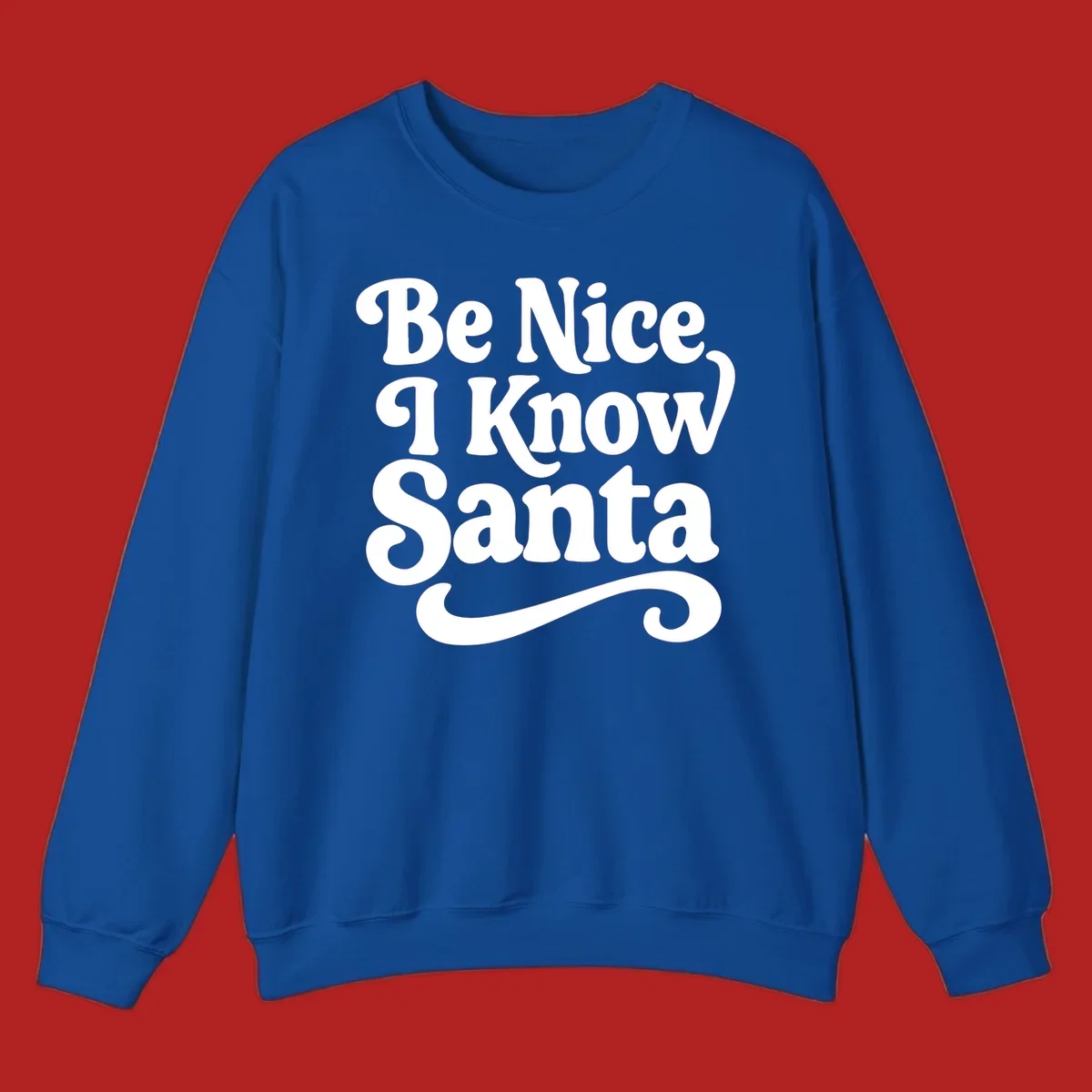 White retro text 'Be Nice I Know Santa' with a flourish, holiday design.
