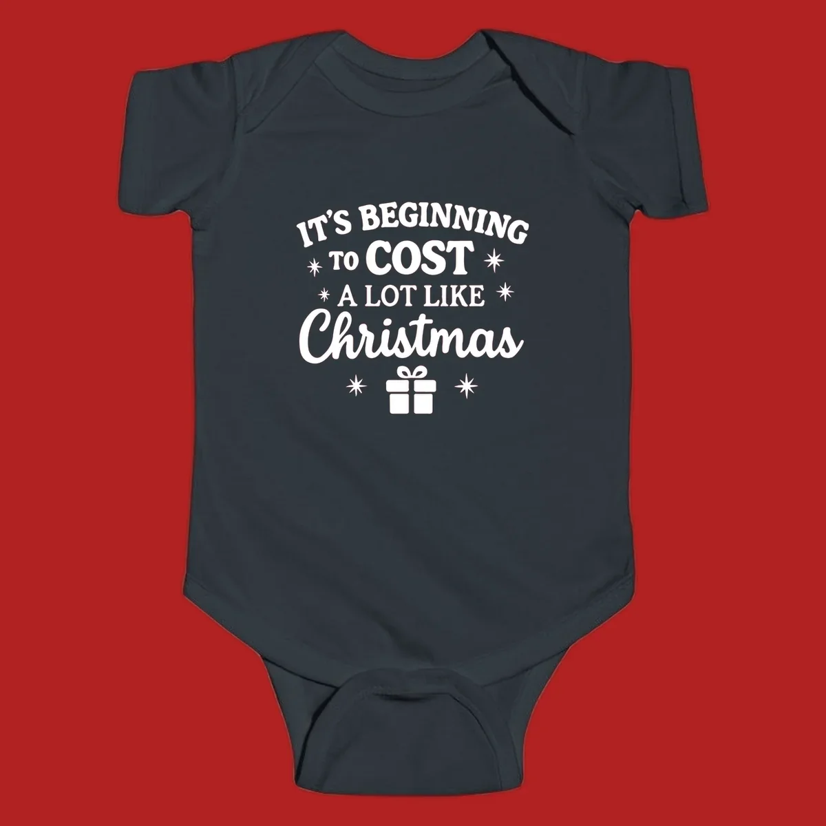 Typography design that says "It's Beginning To Cost A Lot Like Christmas" with stars and a gift box.