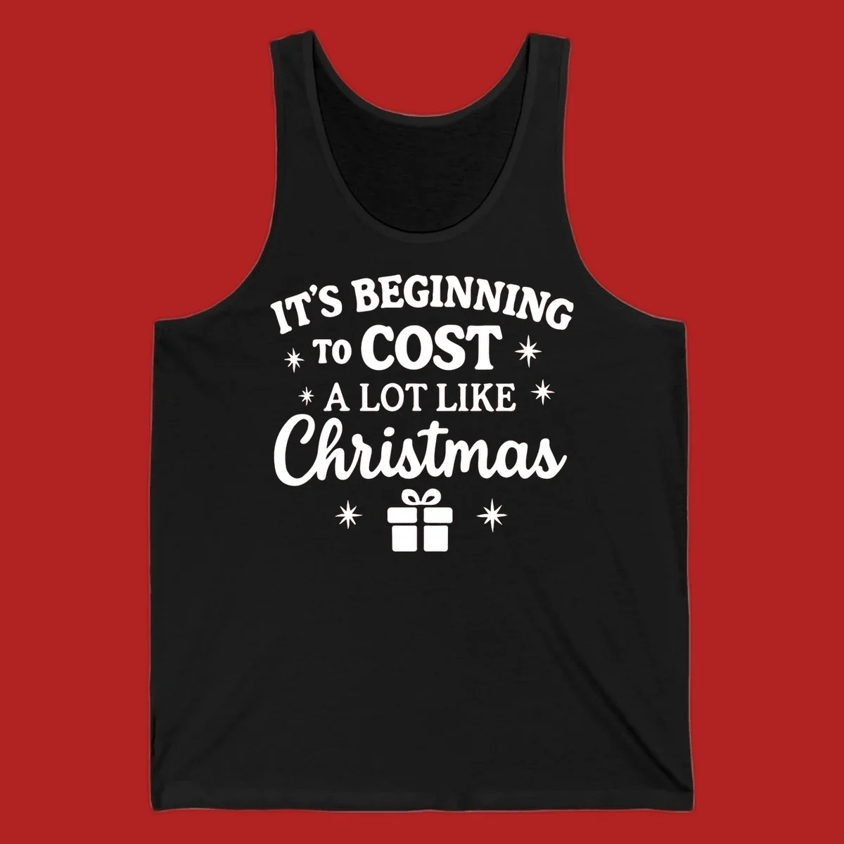 Typography design that says "It's Beginning To Cost A Lot Like Christmas" with stars and a gift box.