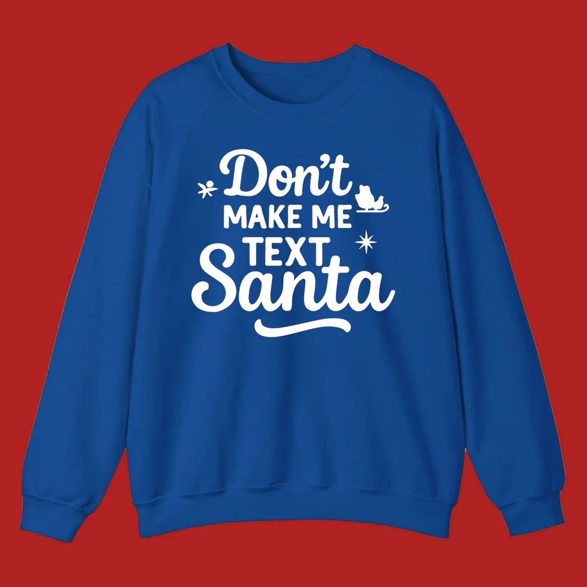 Holiday text design: Don't Make Me Text Santa with Santa in sleigh silhouette.