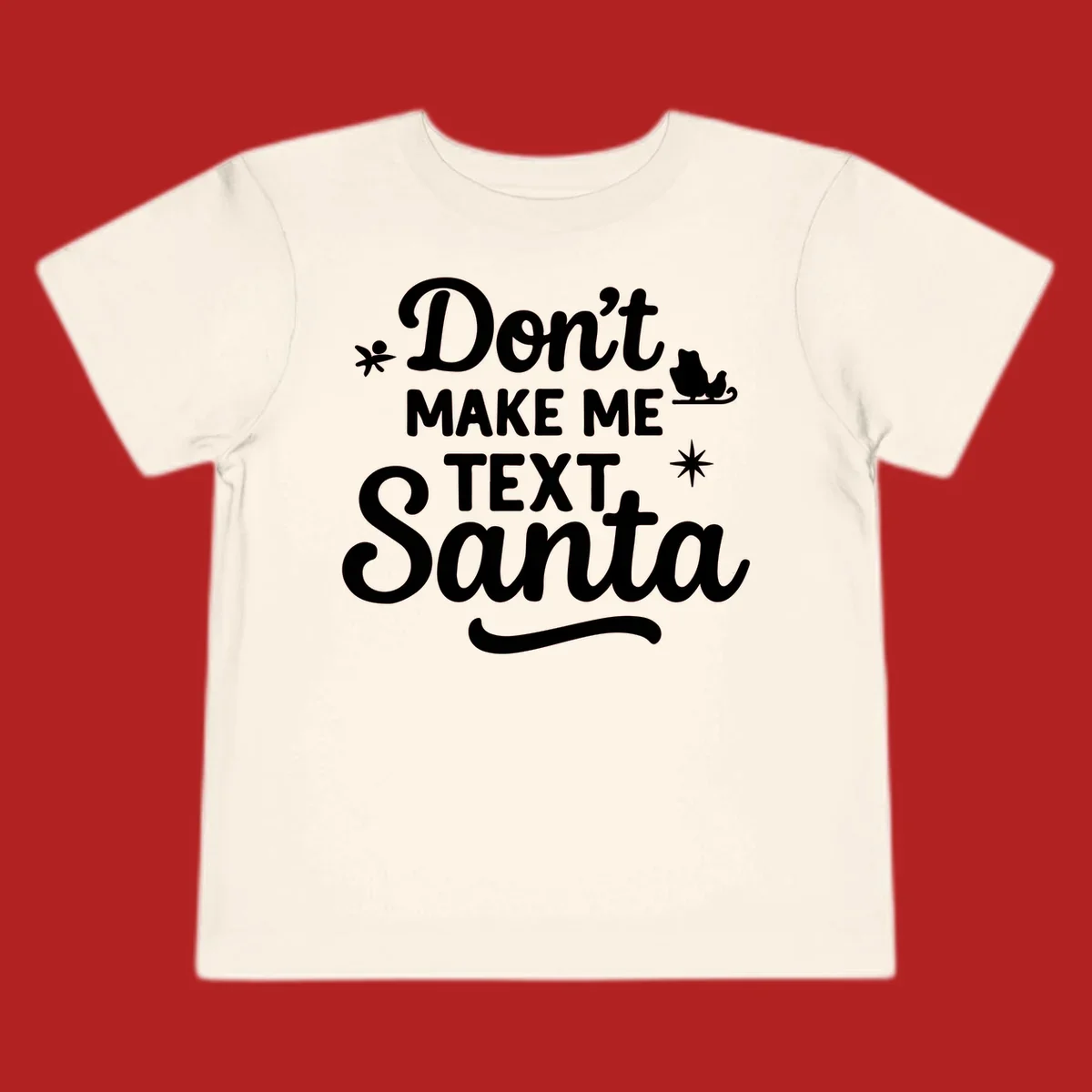 Holiday text design: Don't Make Me Text Santa with Santa in sleigh silhouette.