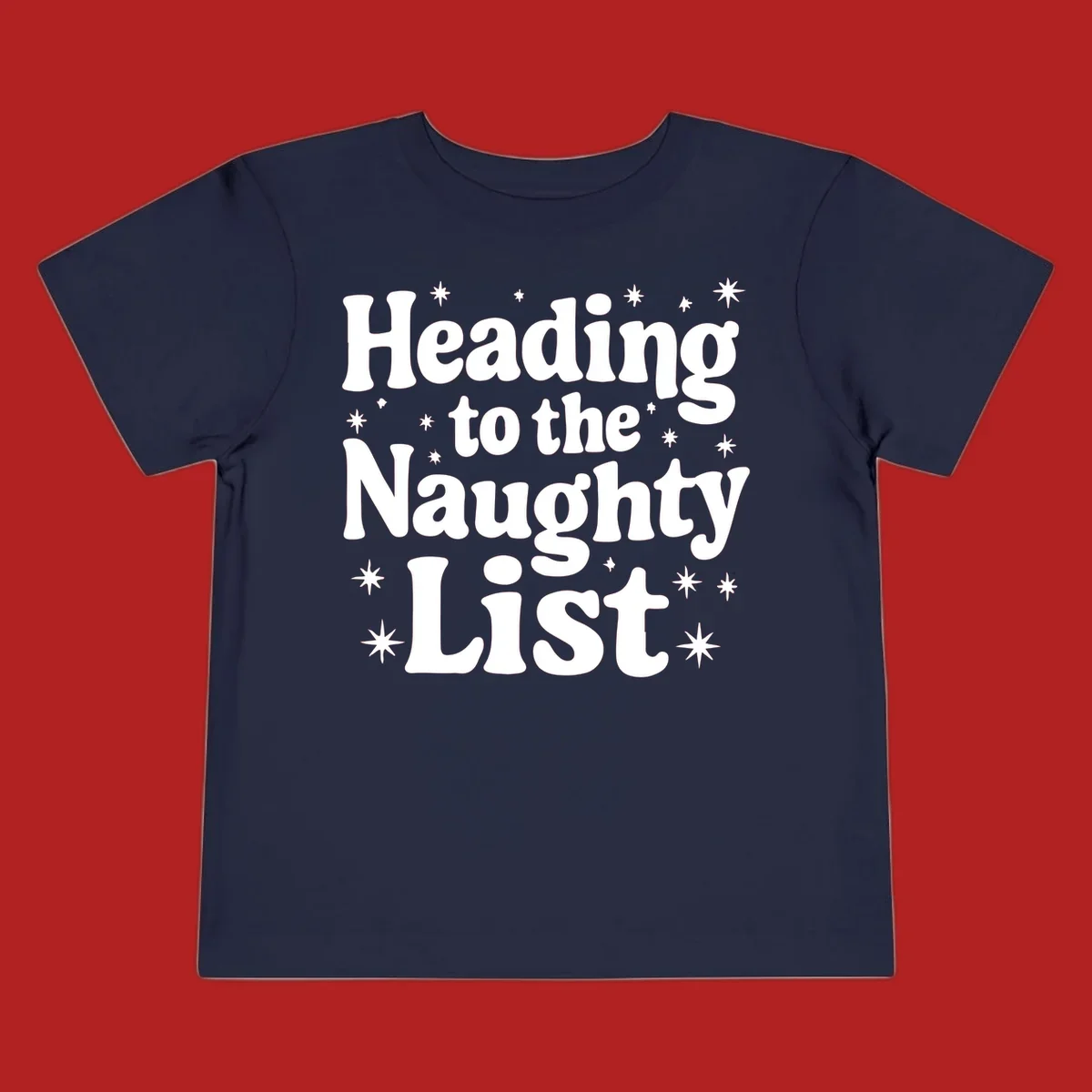 Text design that says "Heading to the Naughty List" with stars, for a naughty list christmas concept.