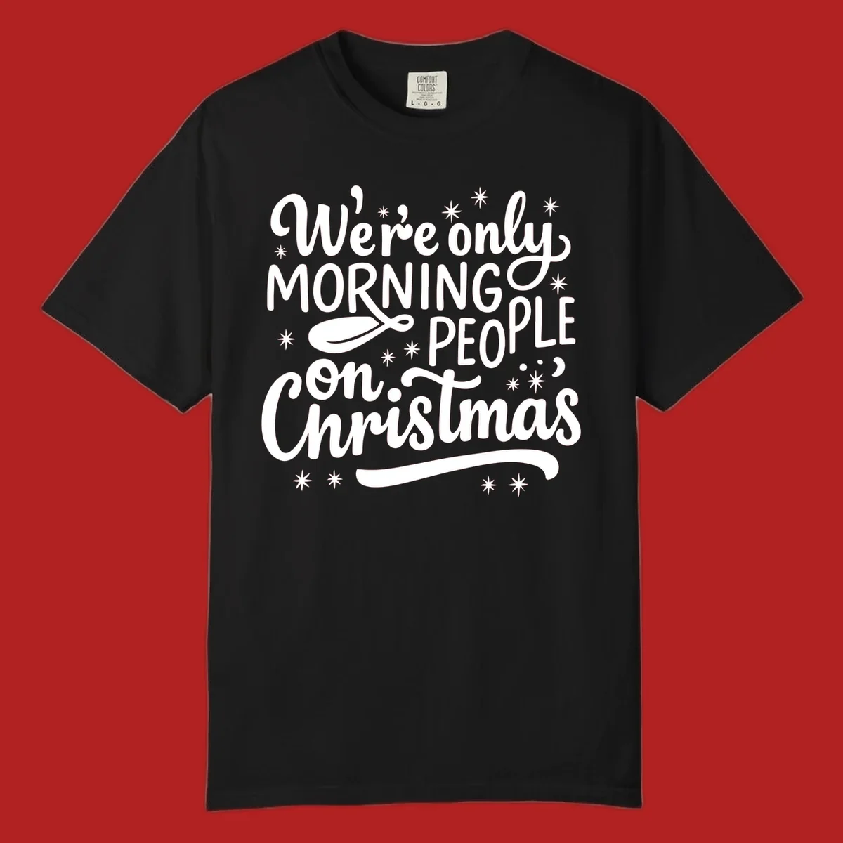 White text that says We're only MORNING PEOPLE on Christmas, with stars and a spoon.