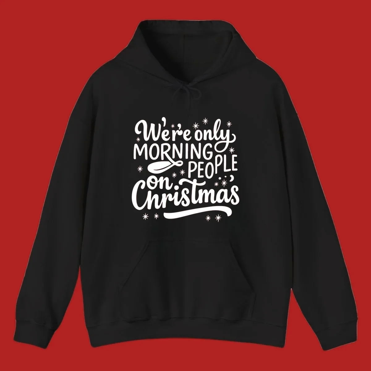White text that says We're only MORNING PEOPLE on Christmas, with stars and a spoon.