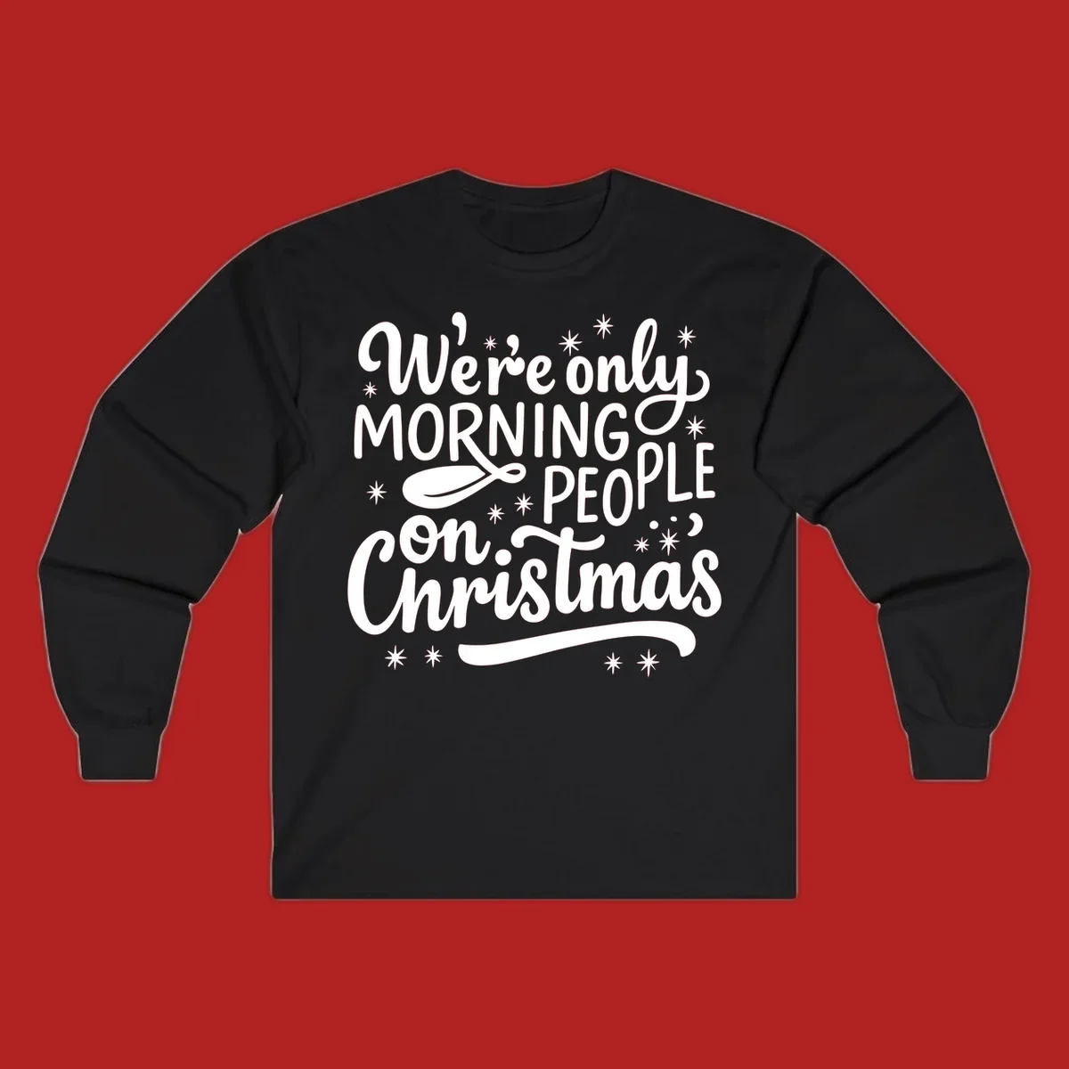 White text that says We're only MORNING PEOPLE on Christmas, with stars and a spoon.
