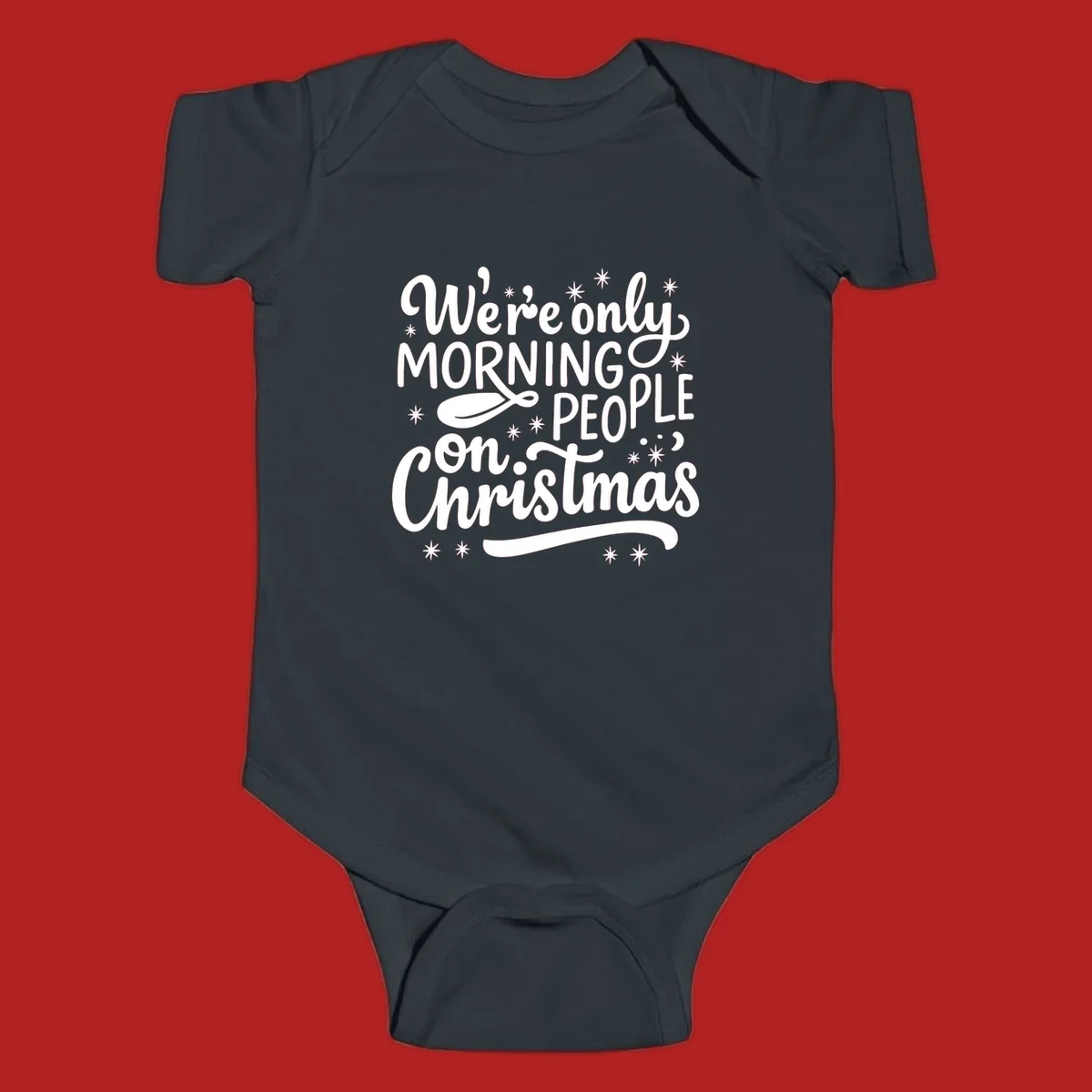 White text that says We're only MORNING PEOPLE on Christmas, with stars and a spoon.