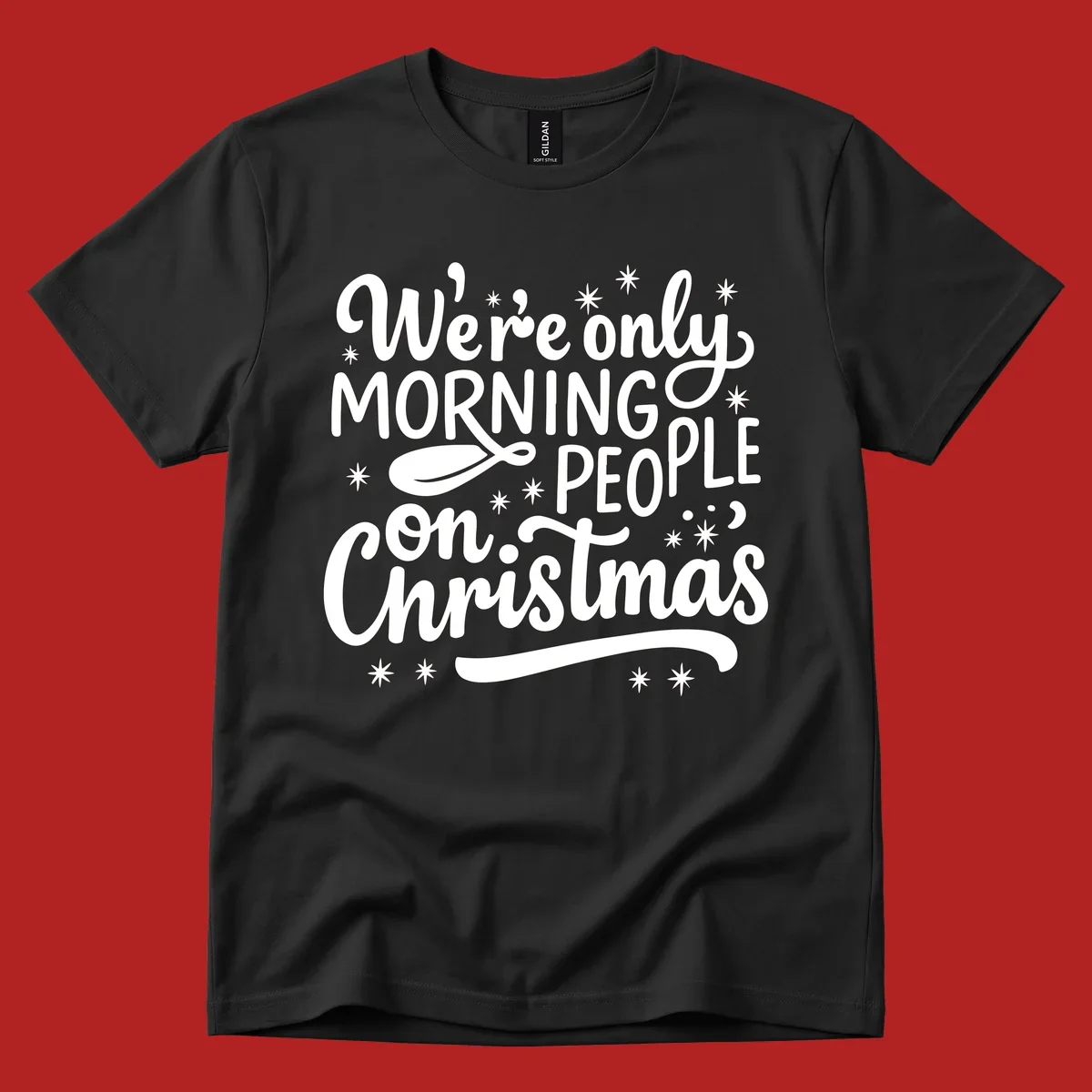 White text that says We're only MORNING PEOPLE on Christmas, with stars and a spoon.