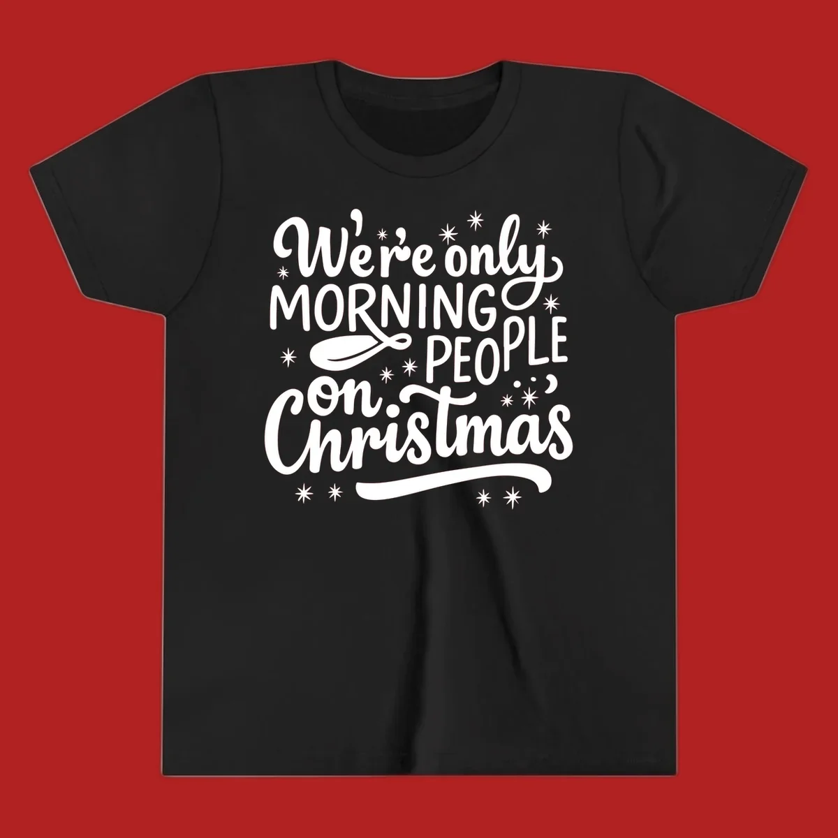 White text that says We're only MORNING PEOPLE on Christmas, with stars and a spoon.