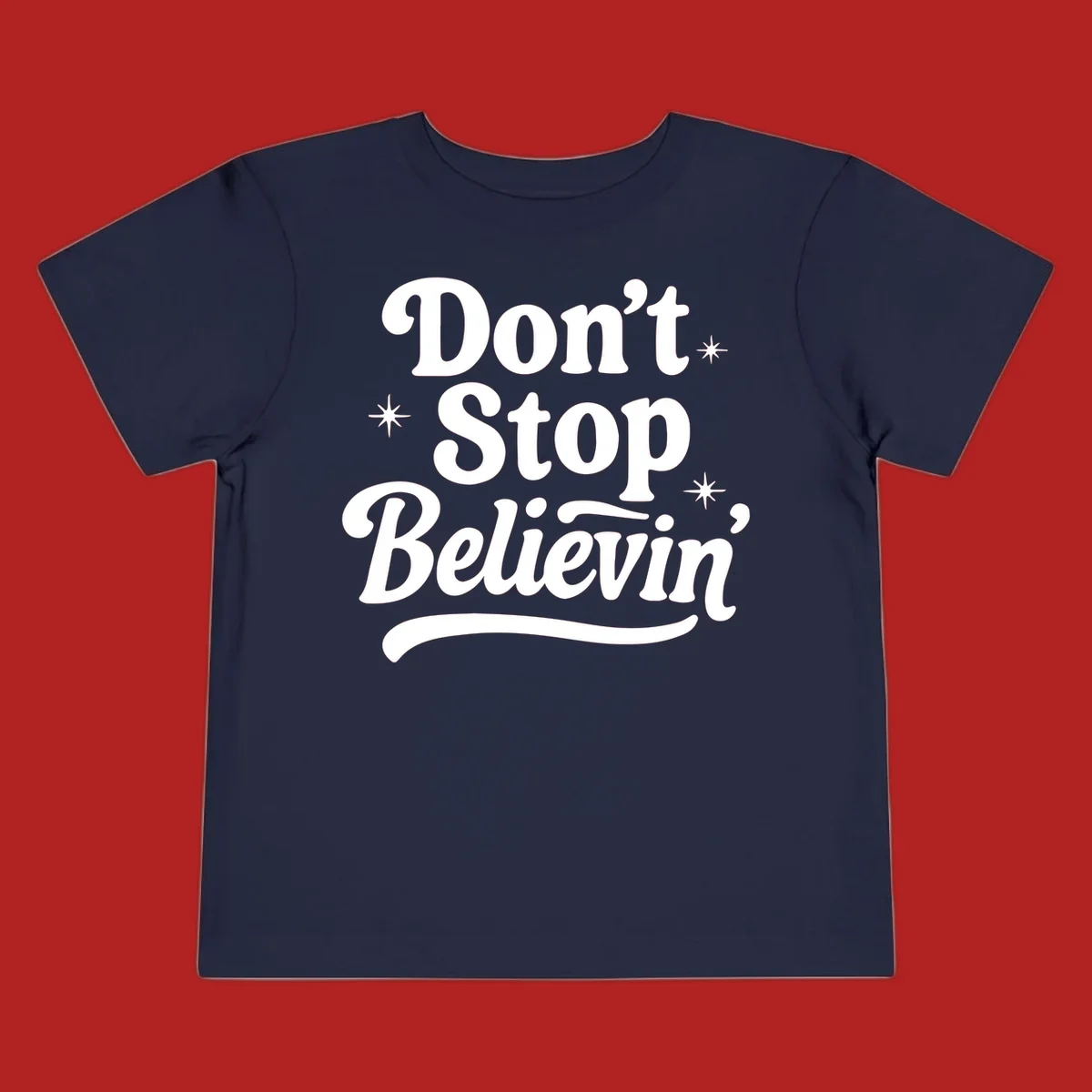 White retro typography 'Don't Stop Believin'' with starbursts on black background.