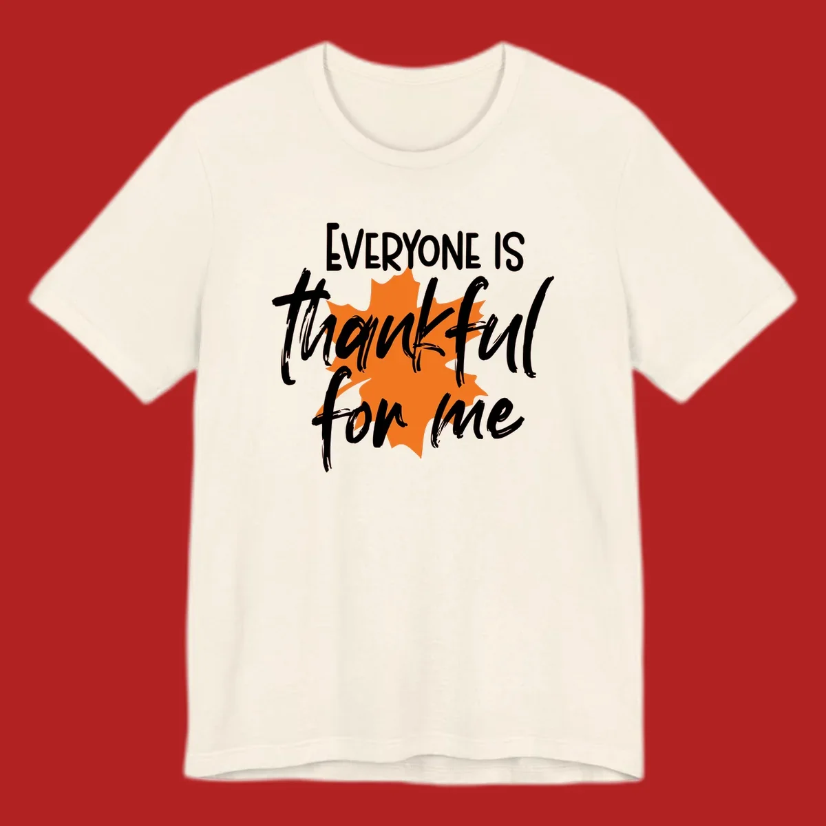 Text that reads "EVERYONE IS thankful for me" over an orange maple leaf. thankful-for-me design.