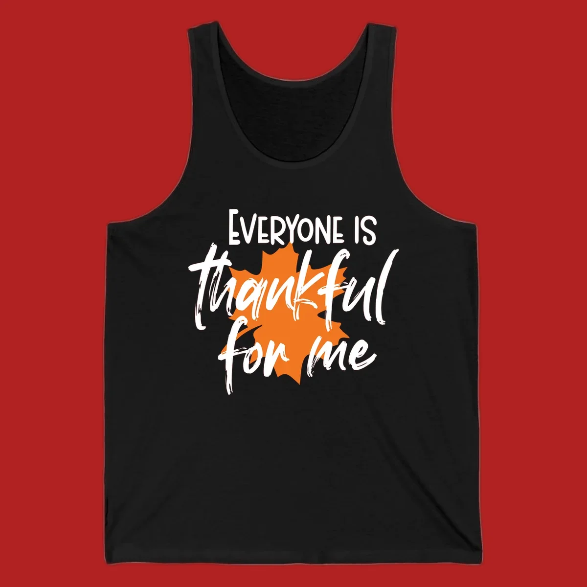 Text that reads "EVERYONE IS thankful for me" over an orange maple leaf. thankful-for-me design.
