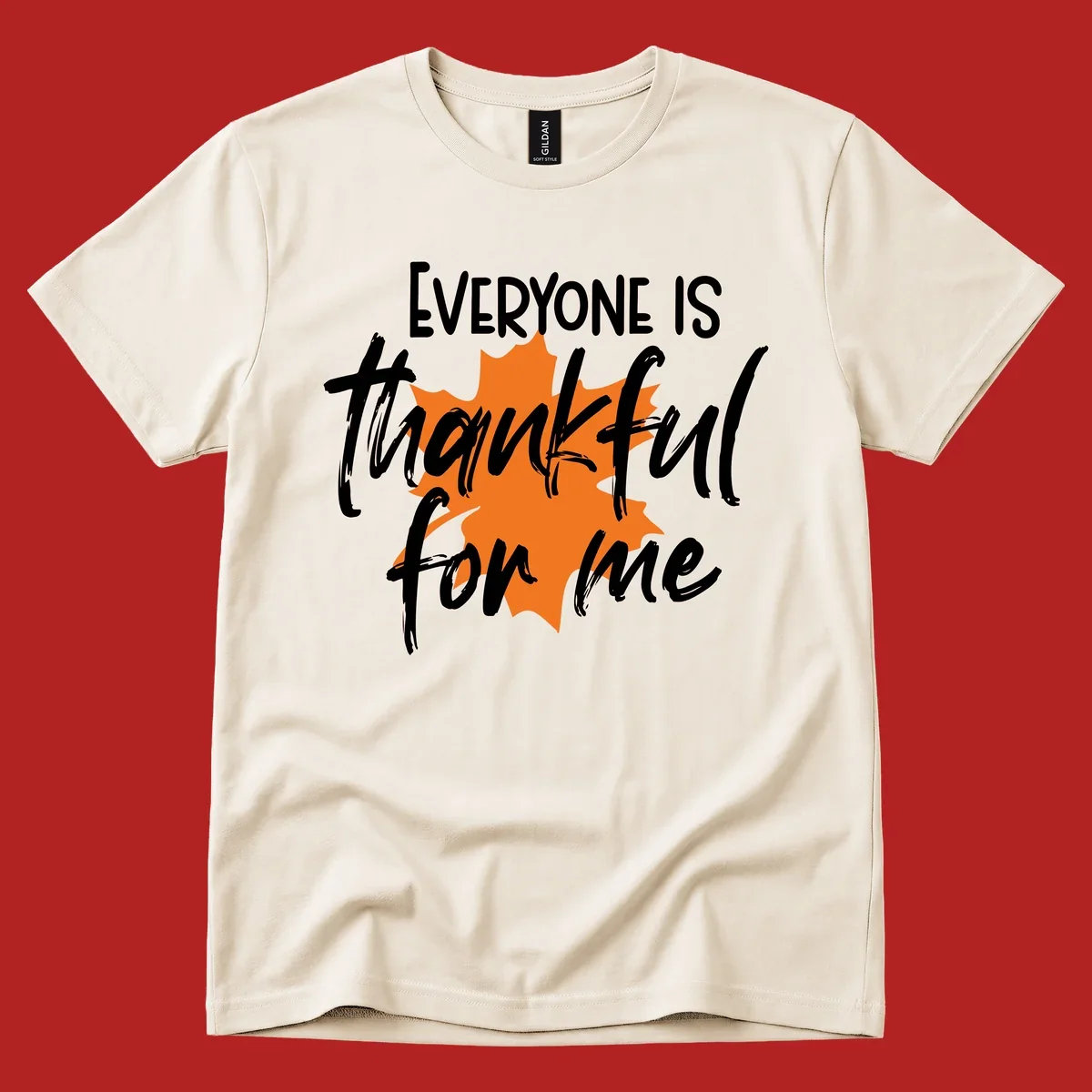 Text that reads "EVERYONE IS thankful for me" over an orange maple leaf. thankful-for-me design.