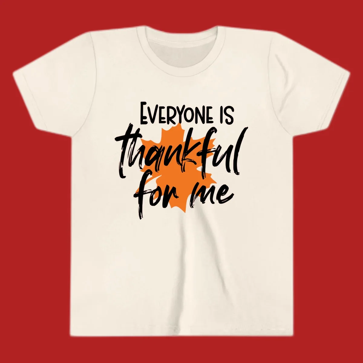 Text that reads "EVERYONE IS thankful for me" over an orange maple leaf. thankful-for-me design.