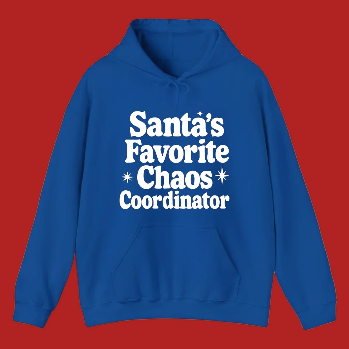 White retro typography reads 'Santa's Favorite Chaos Coordinator' with star accents.