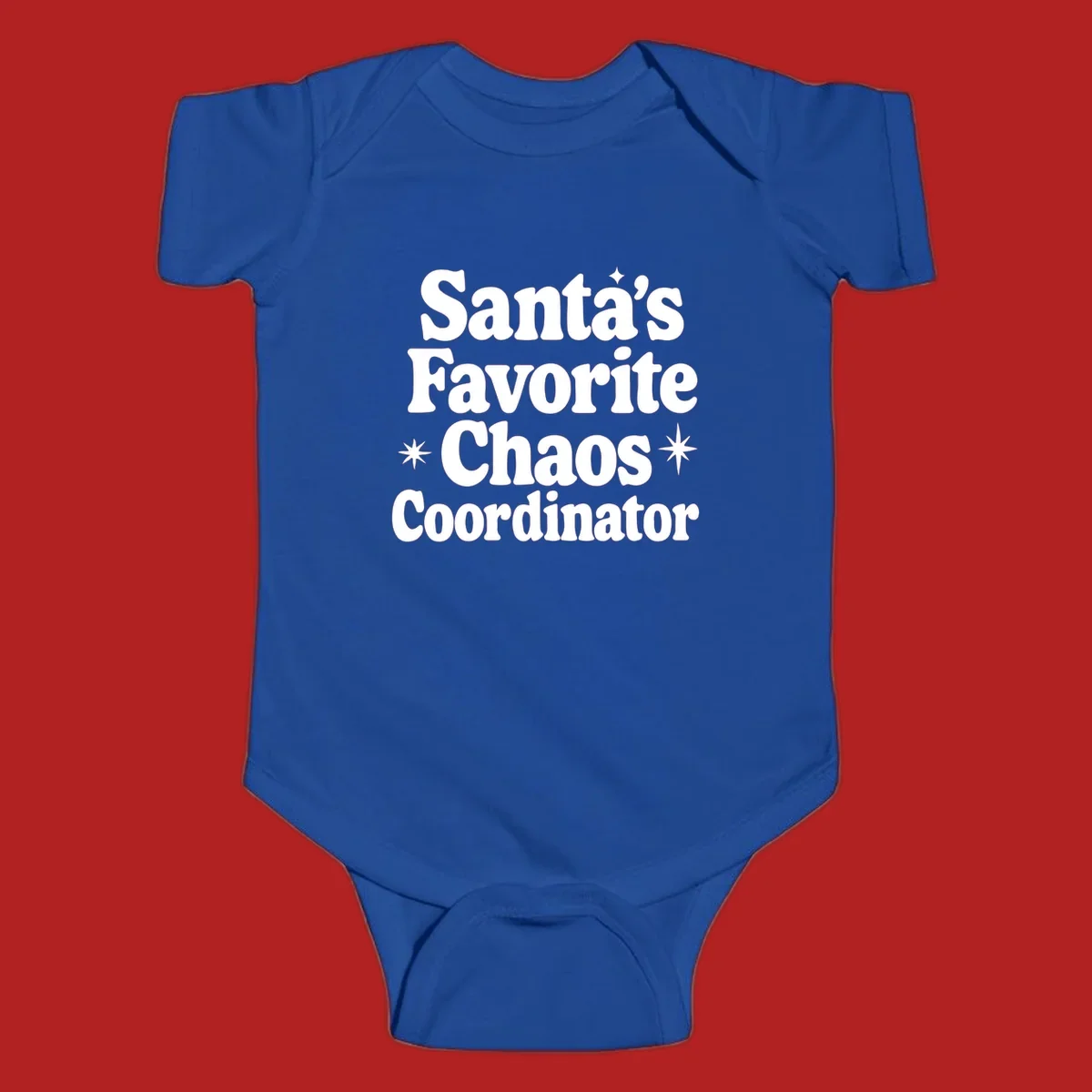 White retro typography reads 'Santa's Favorite Chaos Coordinator' with star accents.