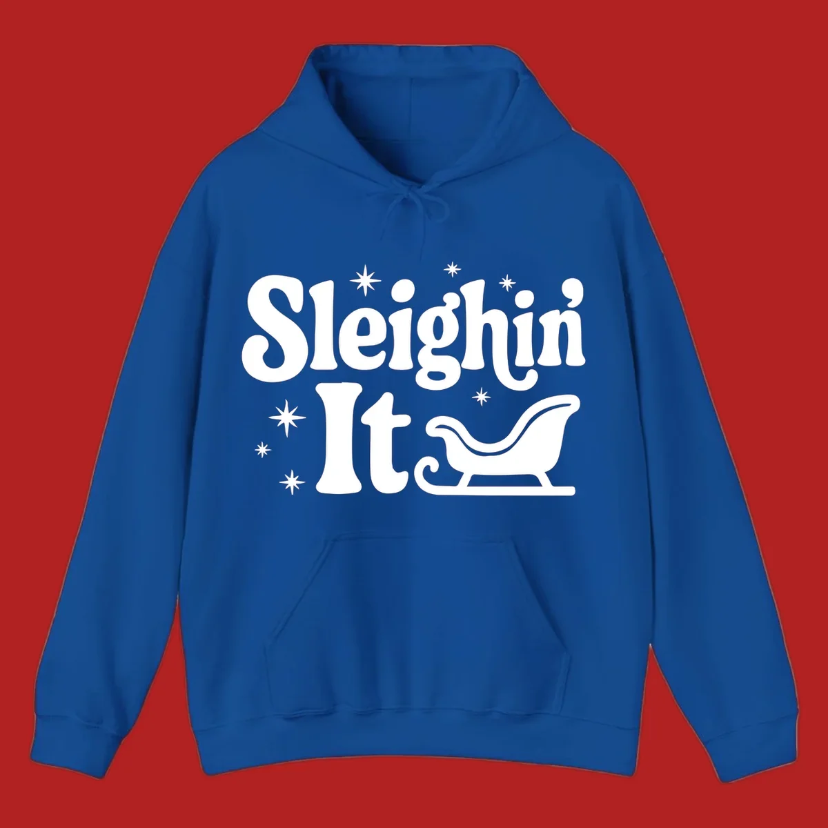 Sleighin It Christmas text and sleigh graphic.