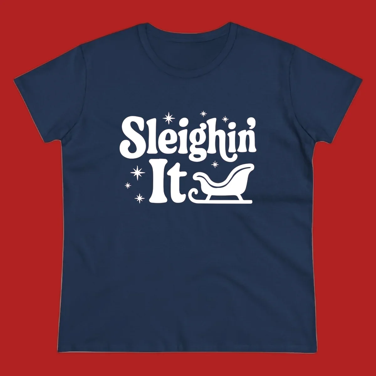 Sleighin It Christmas text and sleigh graphic.