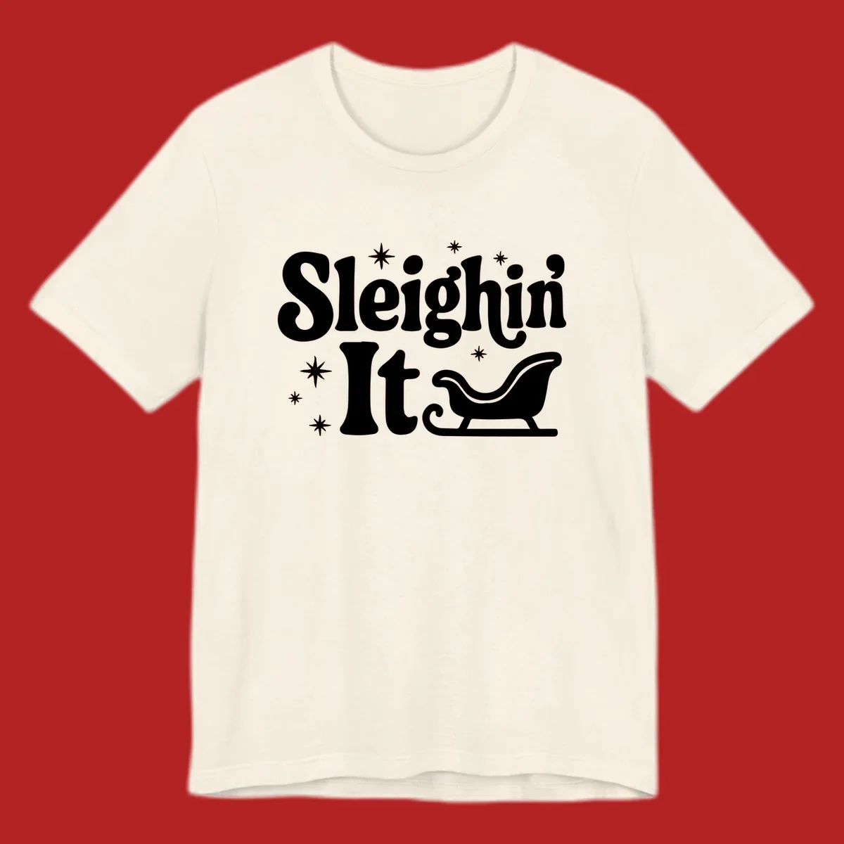 Sleighin It Christmas text and sleigh graphic.