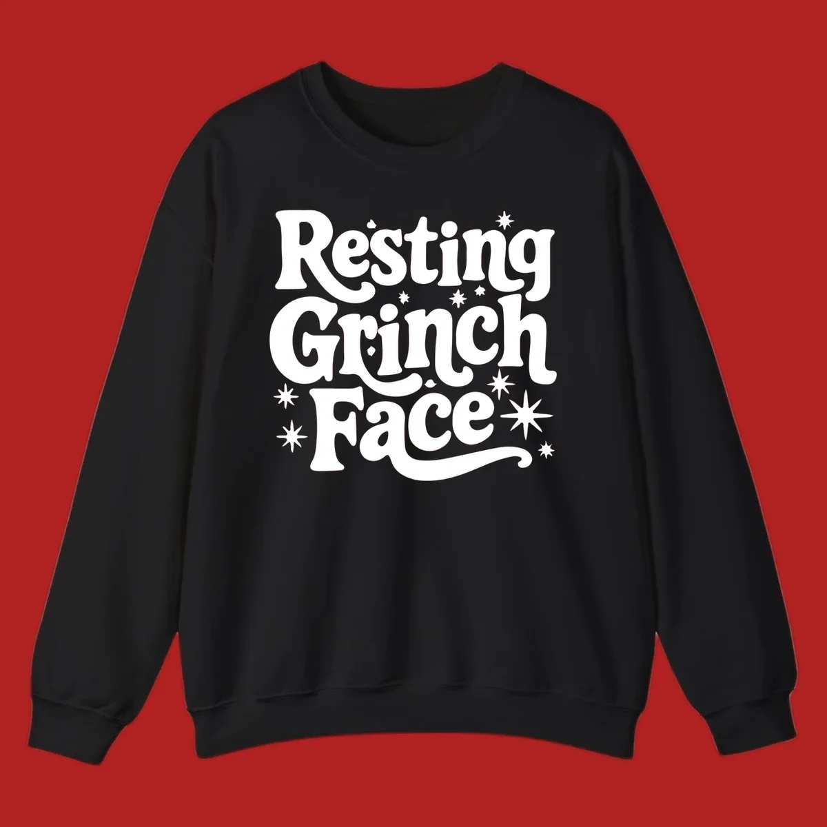 Resting Grinch Face text with stars, holiday design.
