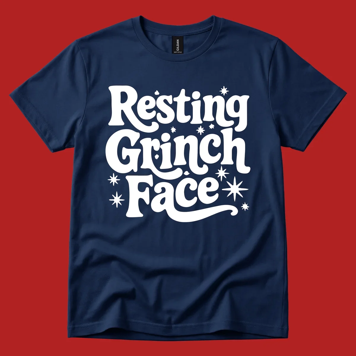 Resting Grinch Face text with stars, holiday design.
