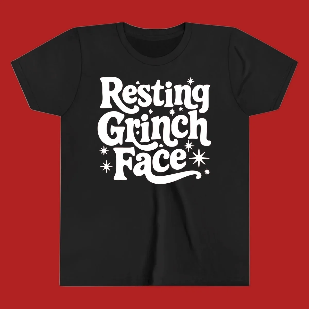 Resting Grinch Face text with stars, holiday design.