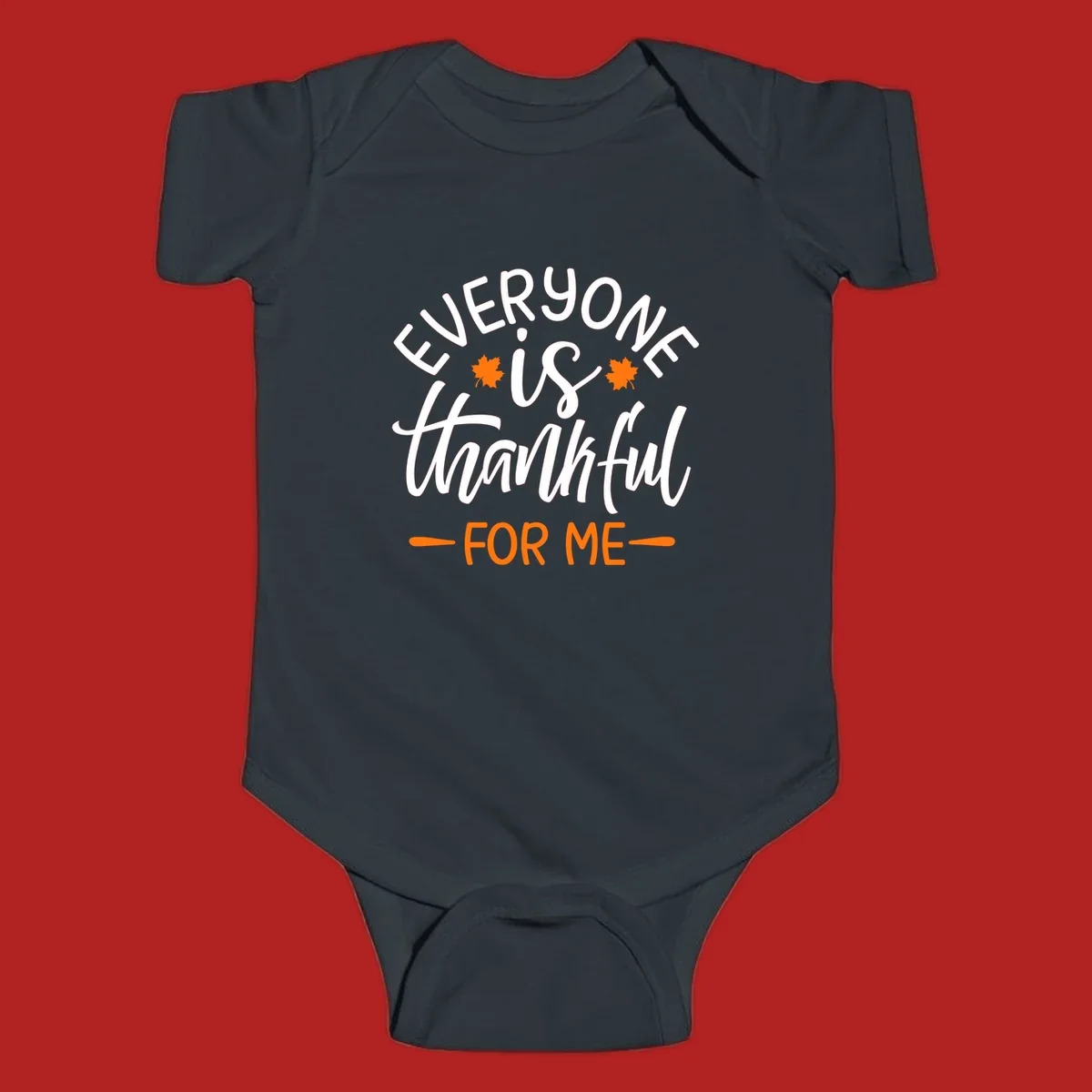 Typography design with text "EVERYONE is thankful FOR ME" and maple leaves, for Thanksgiving.