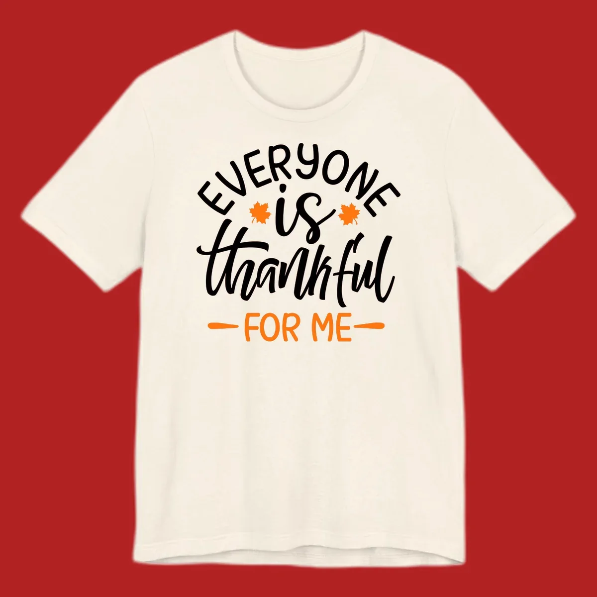Typography design with text "EVERYONE is thankful FOR ME" and maple leaves, for Thanksgiving.