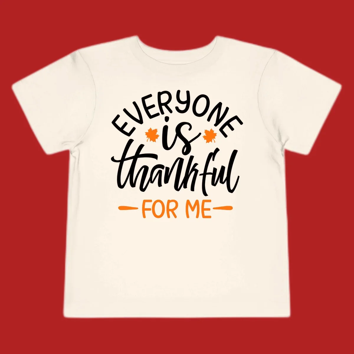 Typography design with text "EVERYONE is thankful FOR ME" and maple leaves, for Thanksgiving.