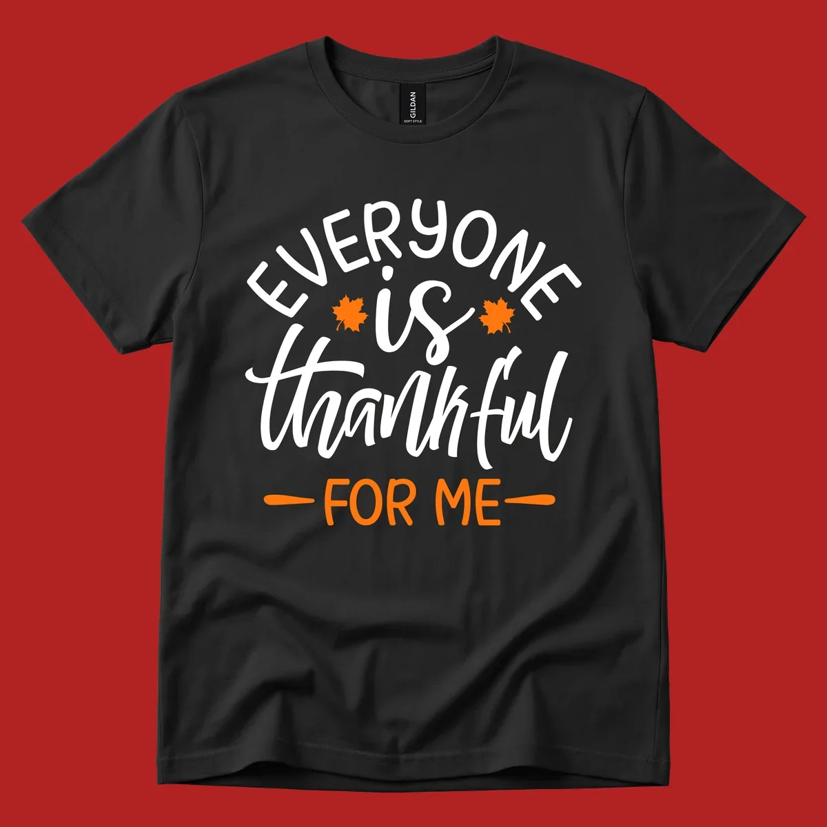 Typography design with text "EVERYONE is thankful FOR ME" and maple leaves, for Thanksgiving.