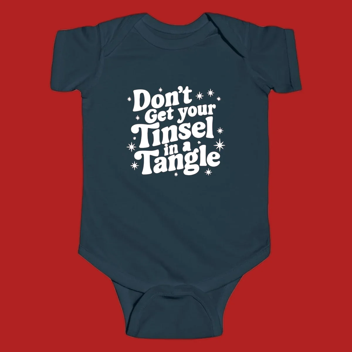 Don't get your tinsel in a tangle holiday text with stars, retro font.