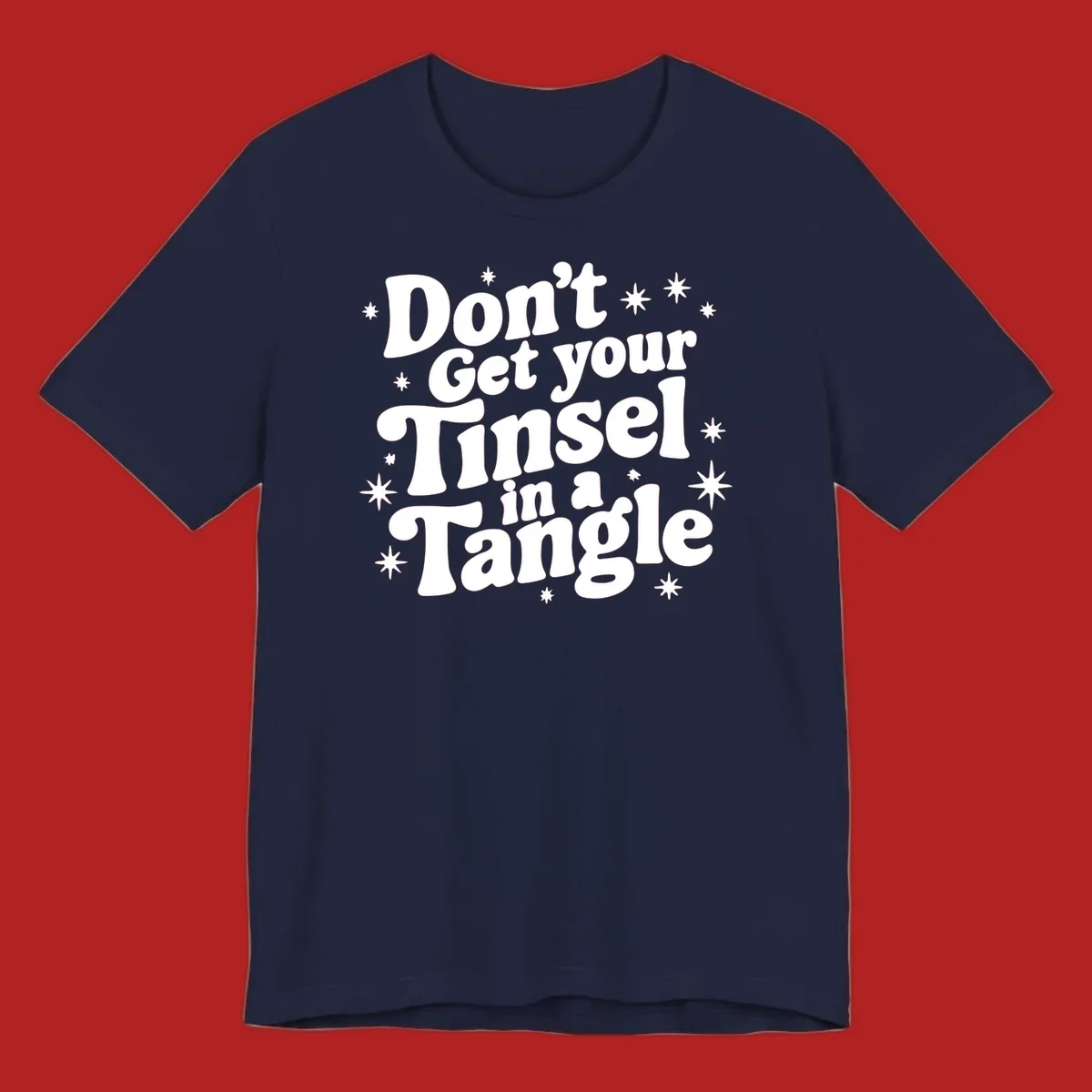 Don't get your tinsel in a tangle holiday text with stars, retro font.