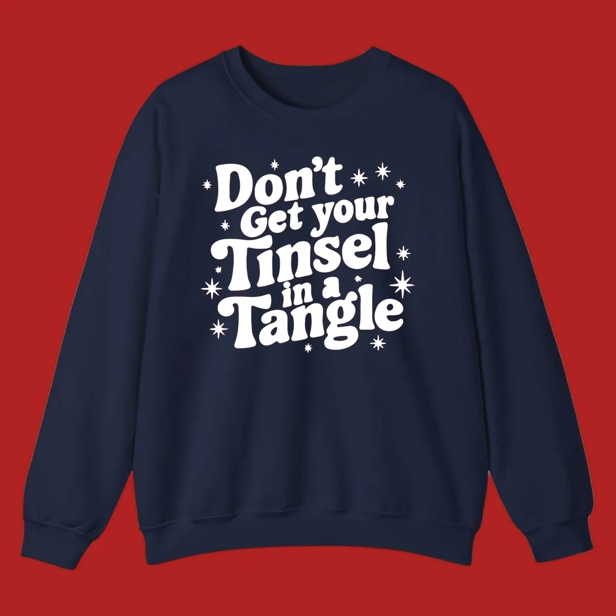 Don't get your tinsel in a tangle holiday text with stars, retro font.