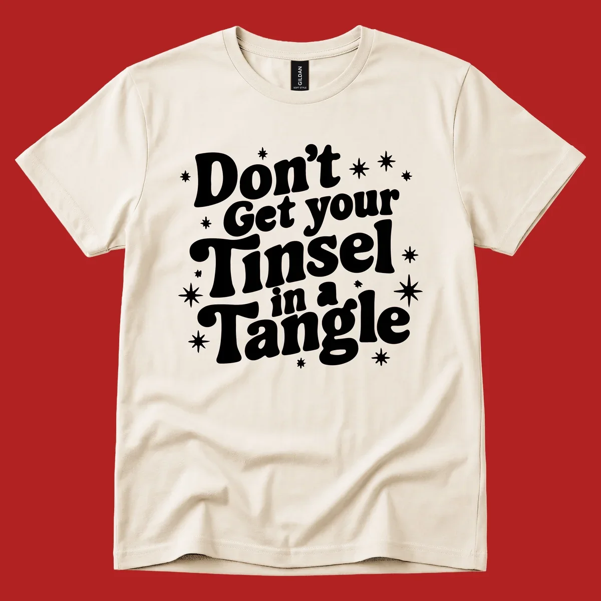 Don't get your tinsel in a tangle holiday text with stars, retro font.