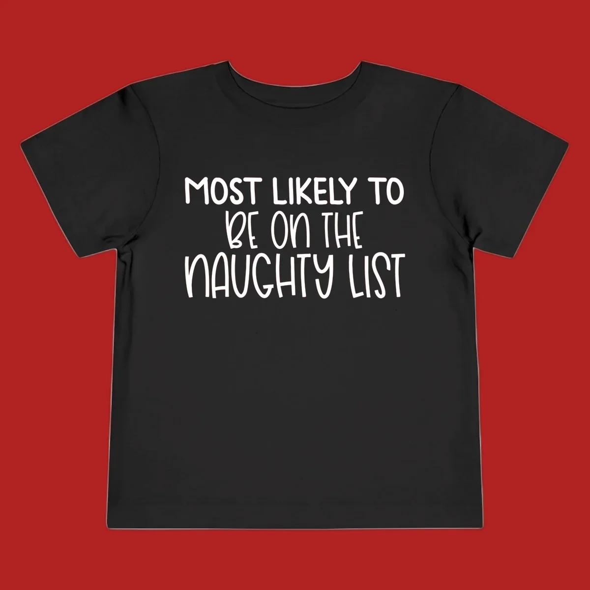 White text on black background reading 'MOST LIKELY TO BE ON THE NAUGHTY LIST', for the naughty list Christmas concept.