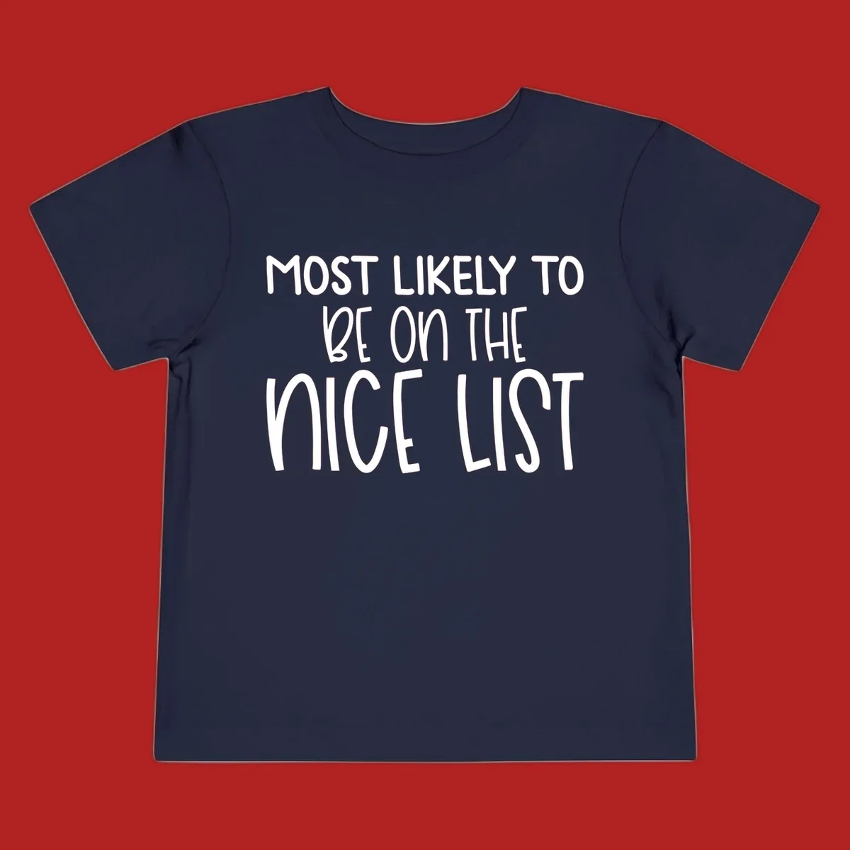 Text design 'Most Likely To Be On The Nice List' in white, celebrating Christmas.
