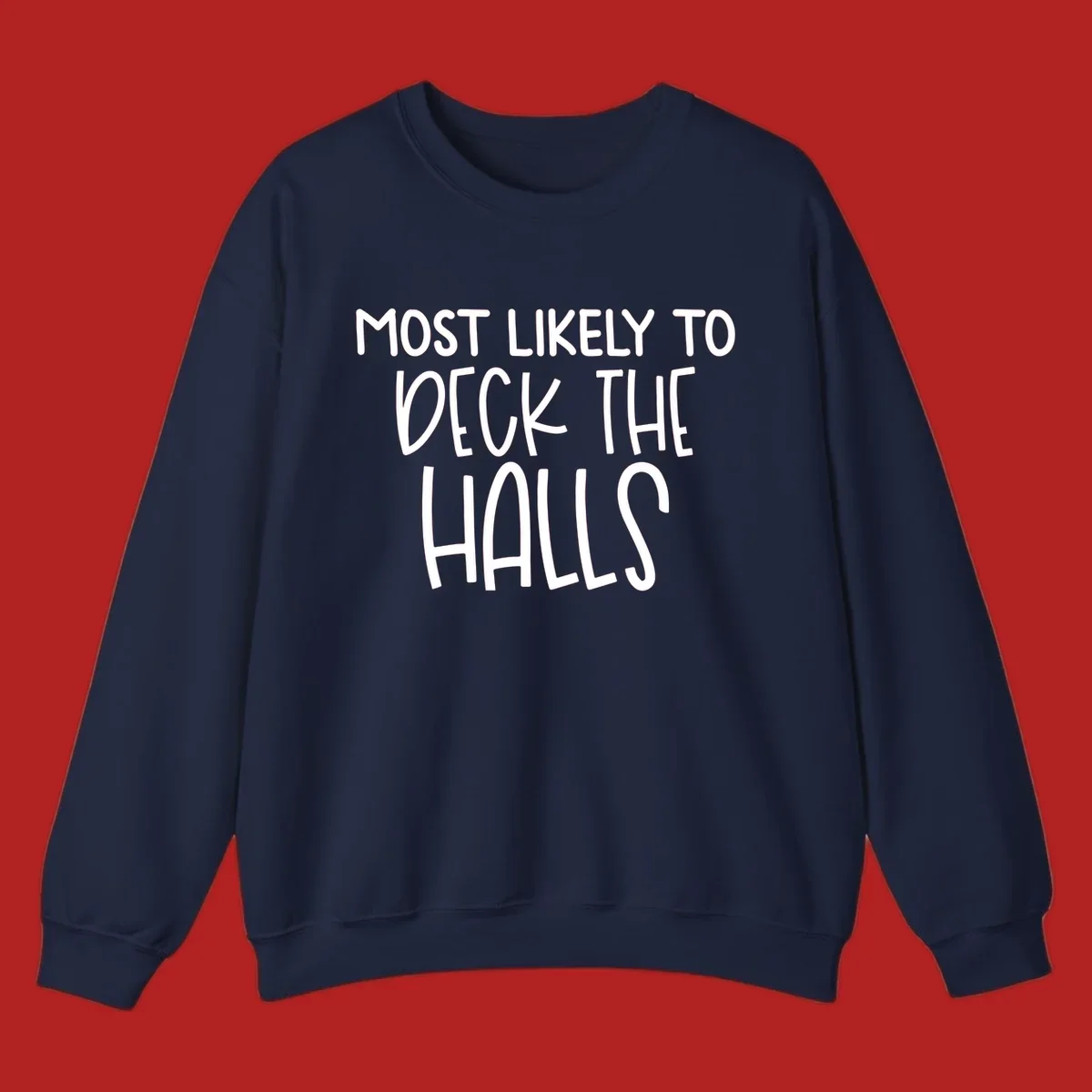 Text design 'Most Likely To Deck The Halls' in white lettering.