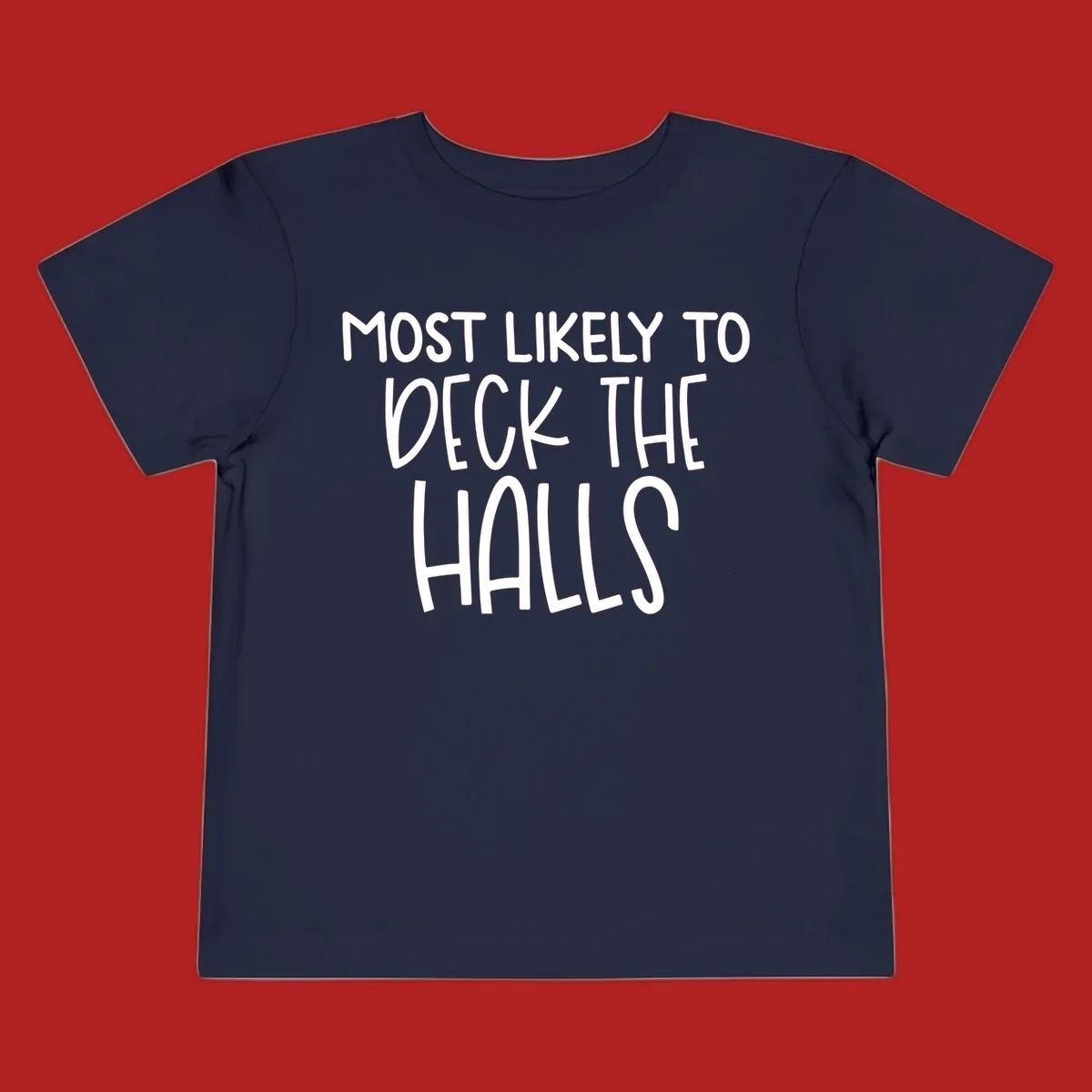 Text design 'Most Likely To Deck The Halls' in white lettering.