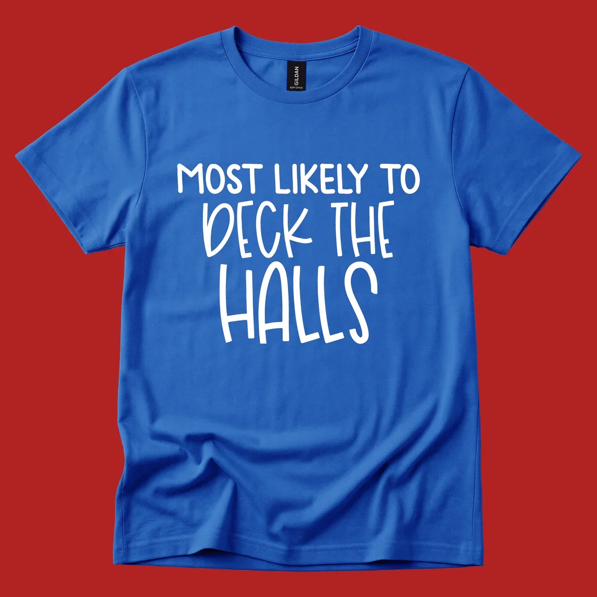 Text design 'Most Likely To Deck The Halls' in white lettering.