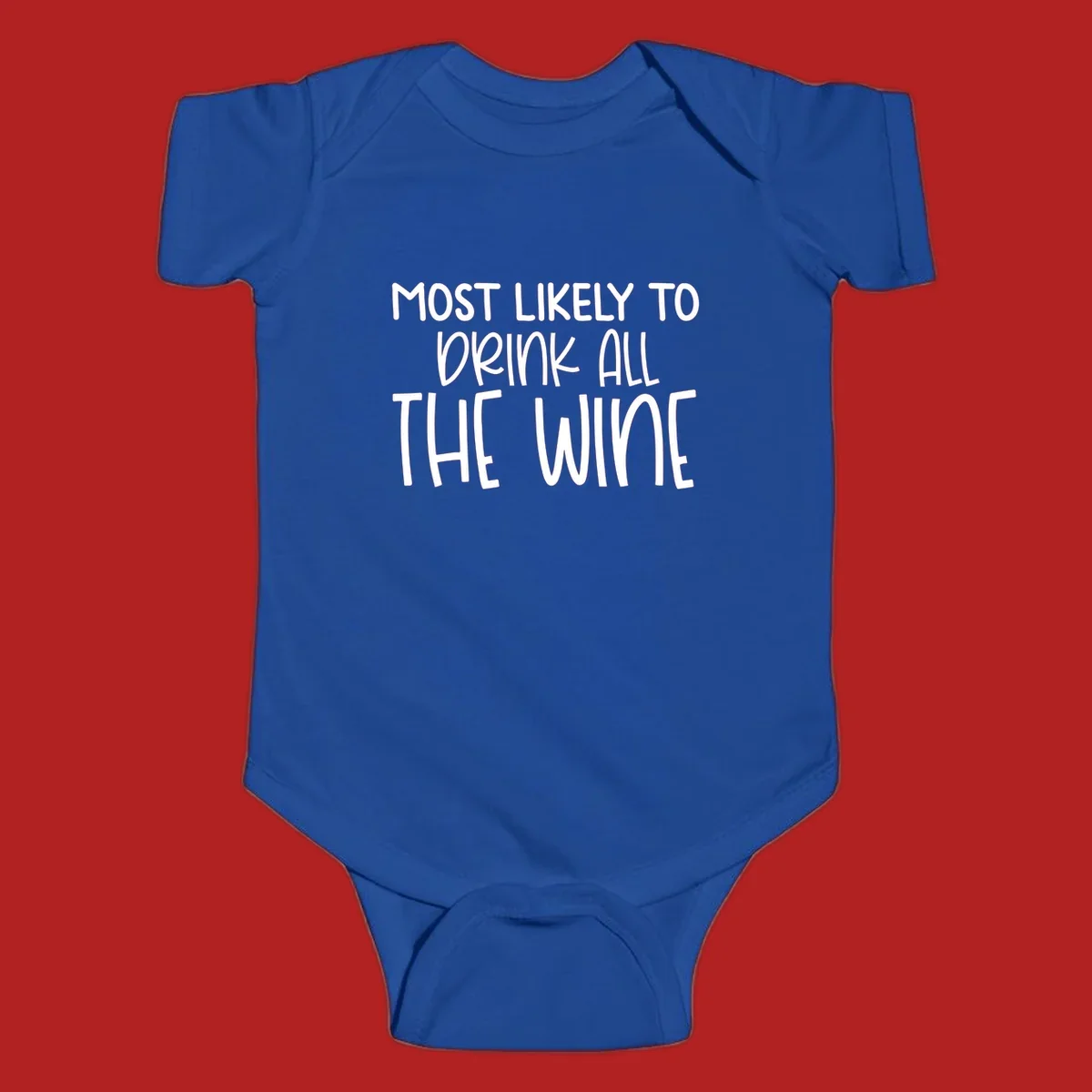 Text design 'MOST LIKELY TO DRINK ALL THE WINE' in white lettering.