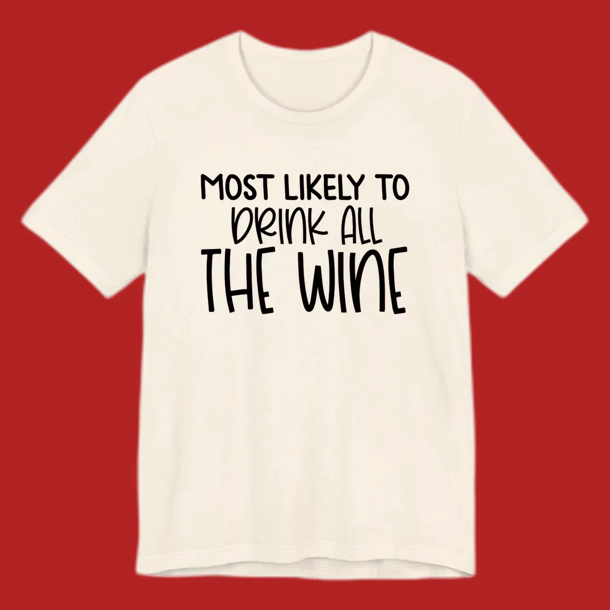 Text design 'MOST LIKELY TO DRINK ALL THE WINE' in white lettering.