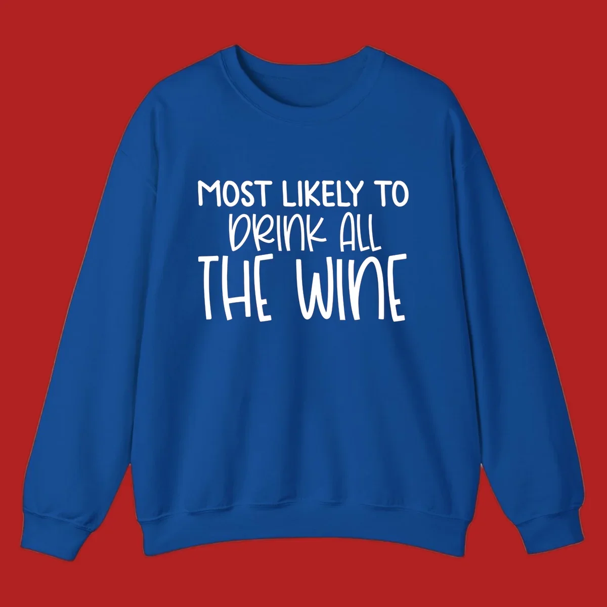 Text design 'MOST LIKELY TO DRINK ALL THE WINE' in white lettering.