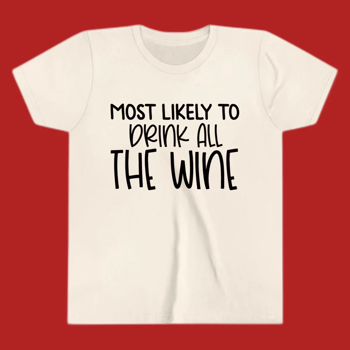 Text design 'MOST LIKELY TO DRINK ALL THE WINE' in white lettering.