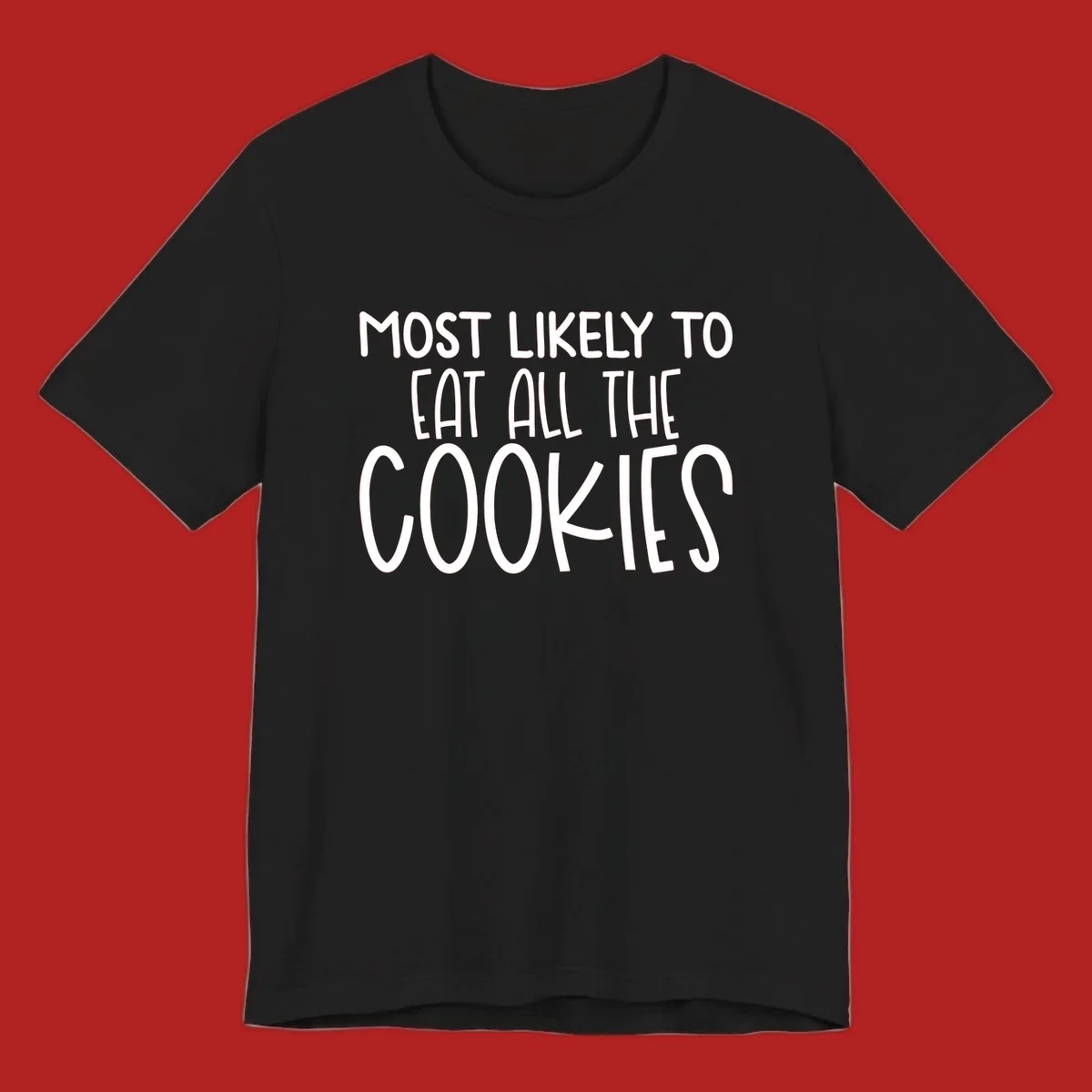 White text 'Most Likely To Eat All The Cookies' on a black background. typography