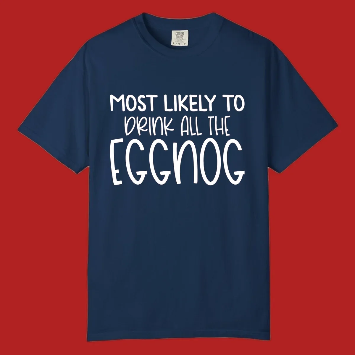 Text design 'Most Likely To Drink All The Eggnog' in white festive lettering for Christmas.