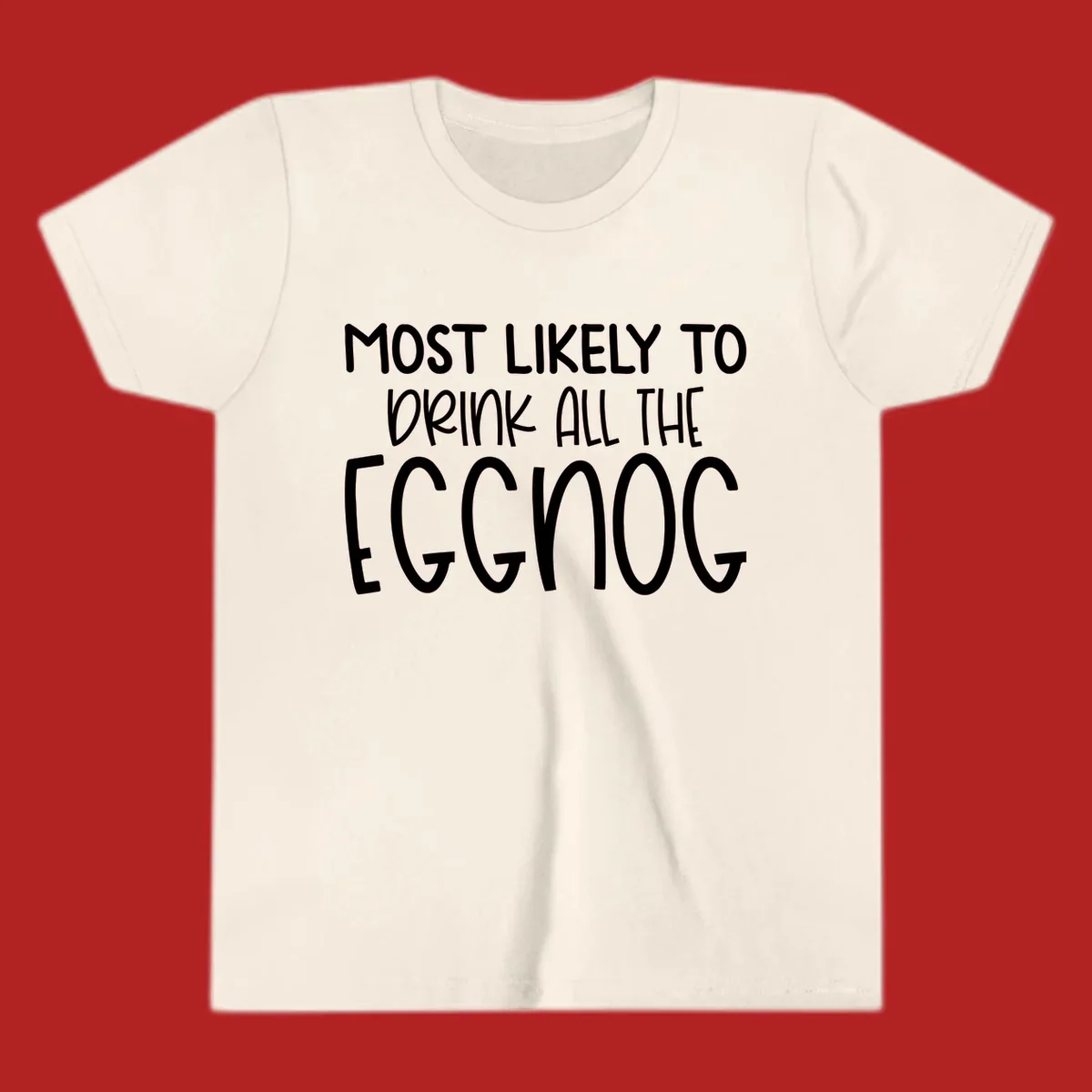 Text design 'Most Likely To Drink All The Eggnog' in white festive lettering for Christmas.