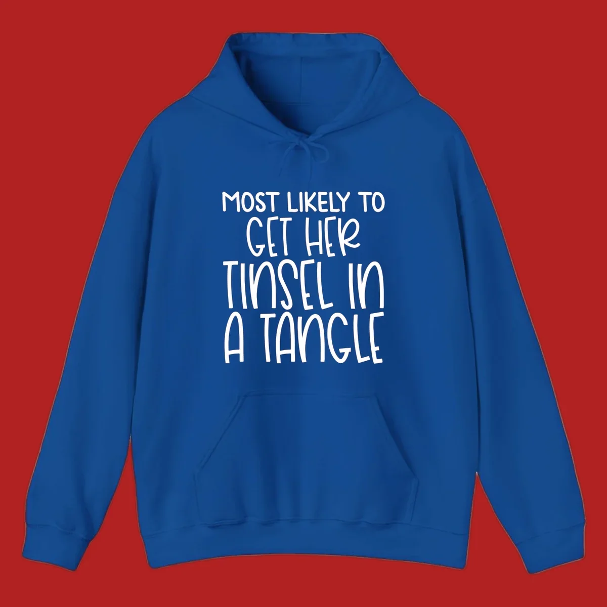 White text 'Most Likely To Get Her Tinsel In A Tangle' on a black background, holiday phrase.
